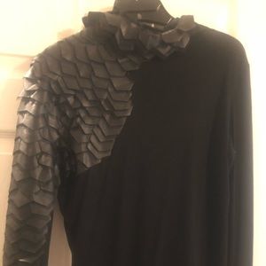 Black mock turtleneck with faux leather accents